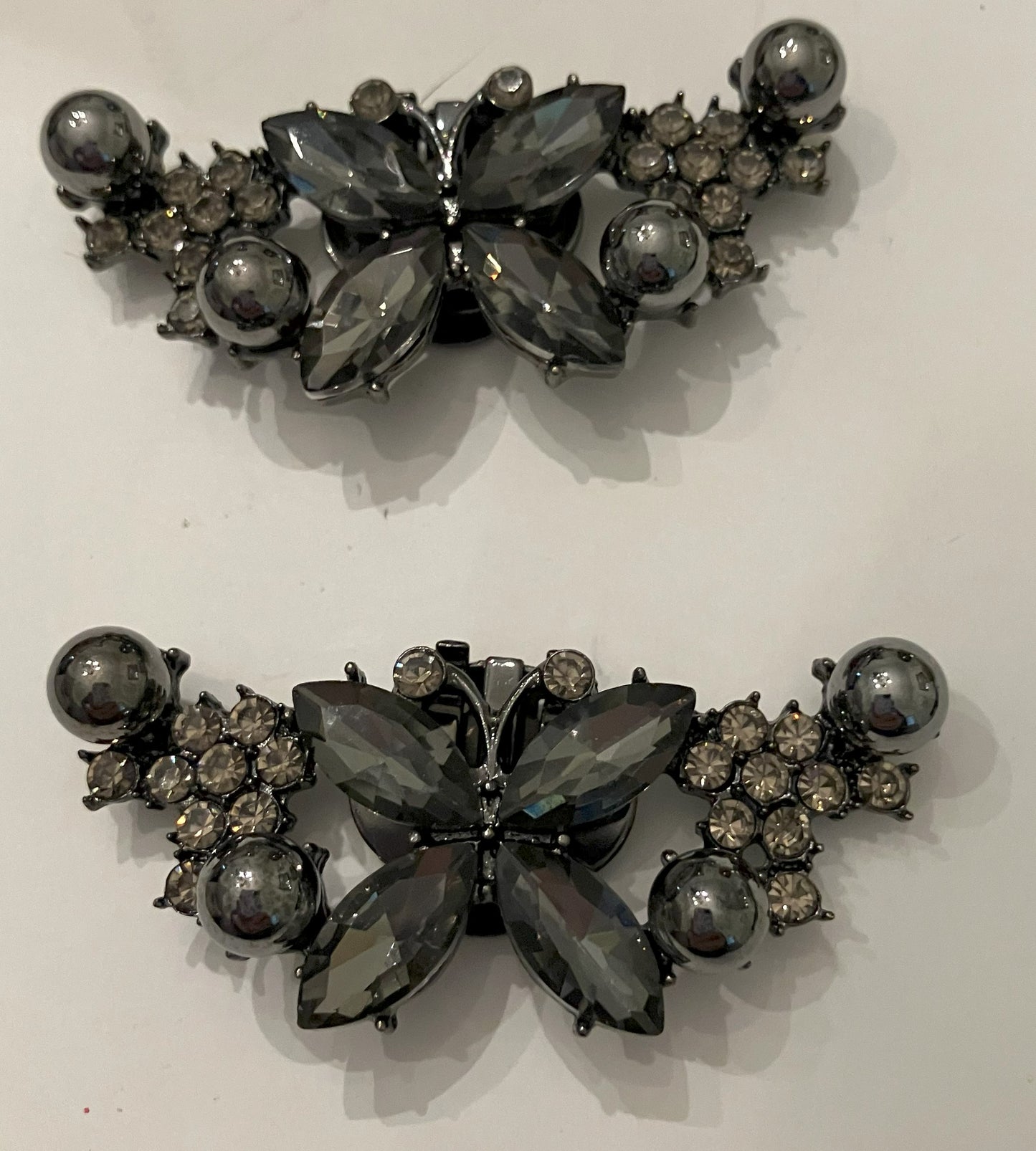 Dark butterfly shoe buckles