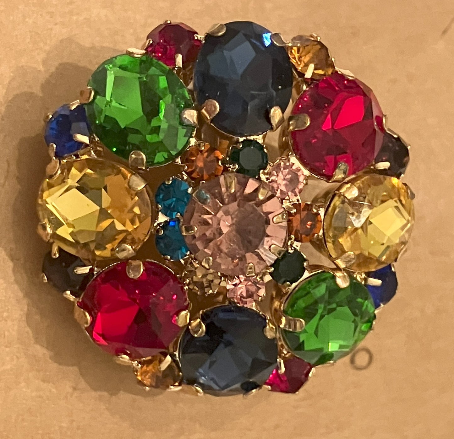 Brooch with multiple colored gemstones