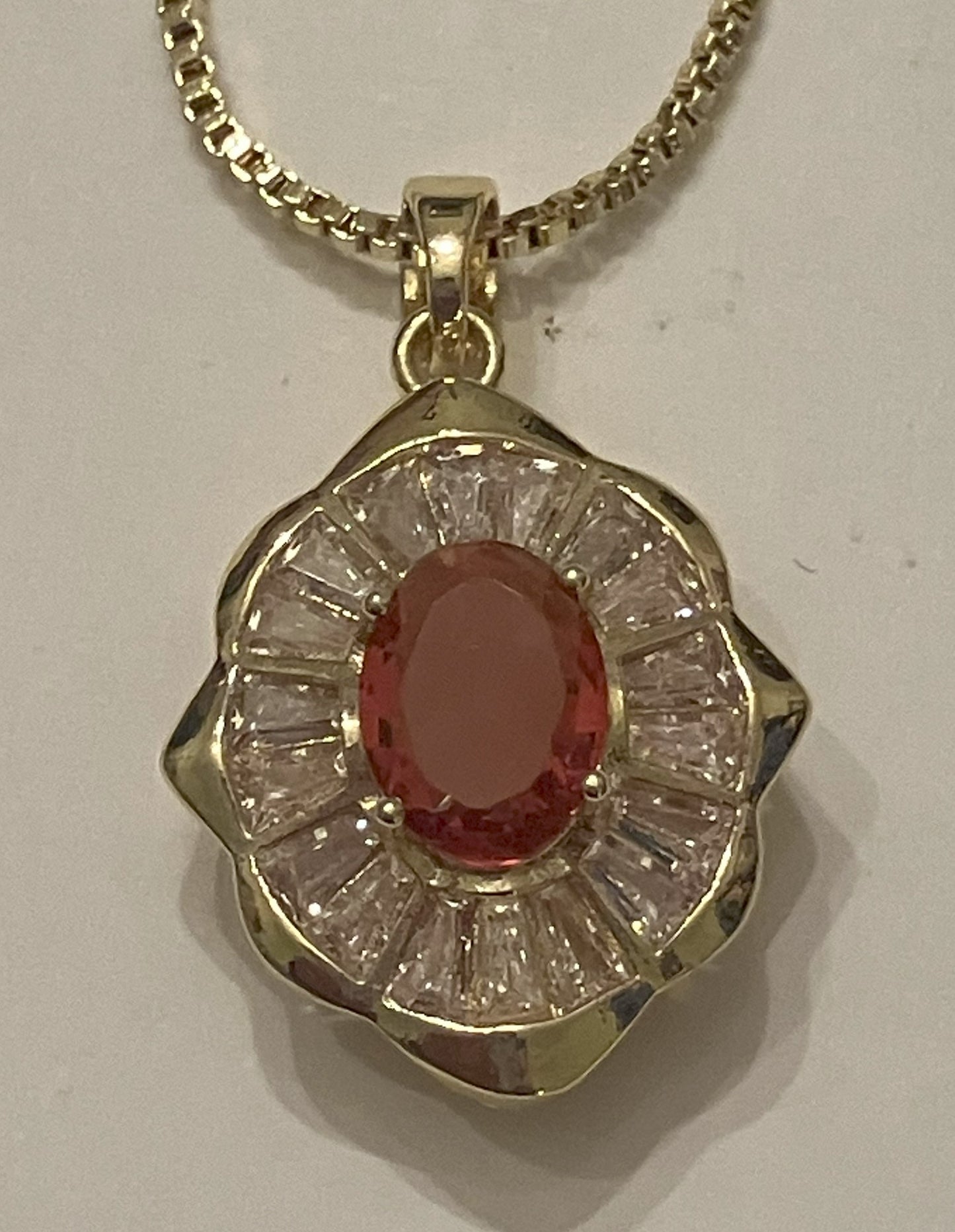 Oval red gemstone pendant