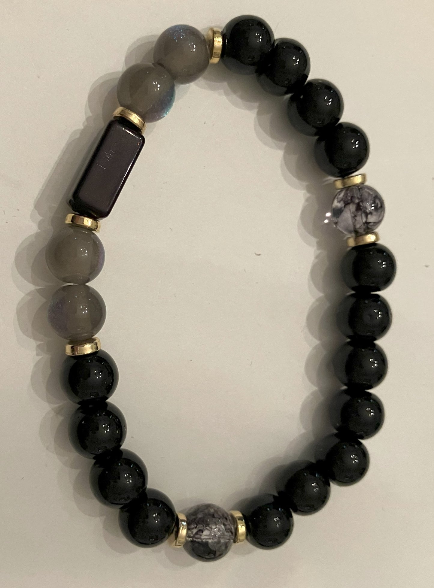 black bracelet with grey accents