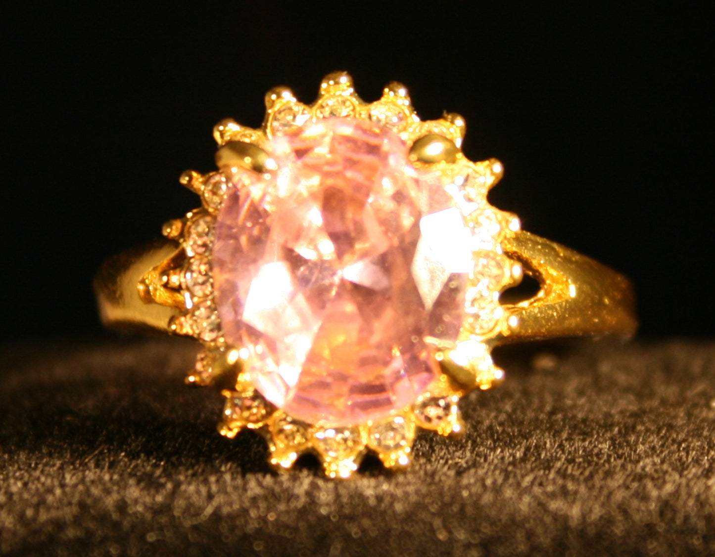 starburst pattern with Pink Oval gemstone