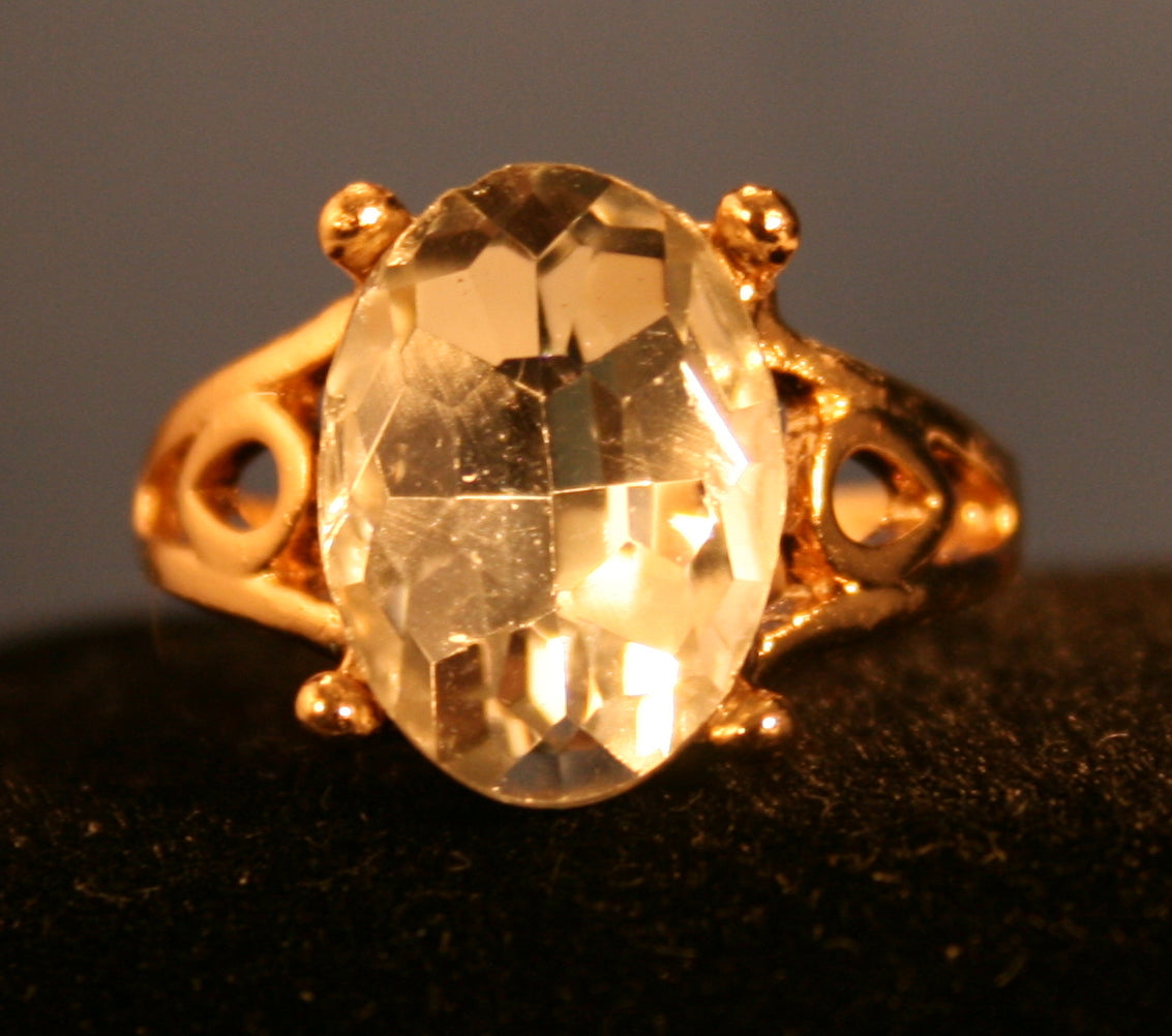 oval-shaped, clear faceted gemstone