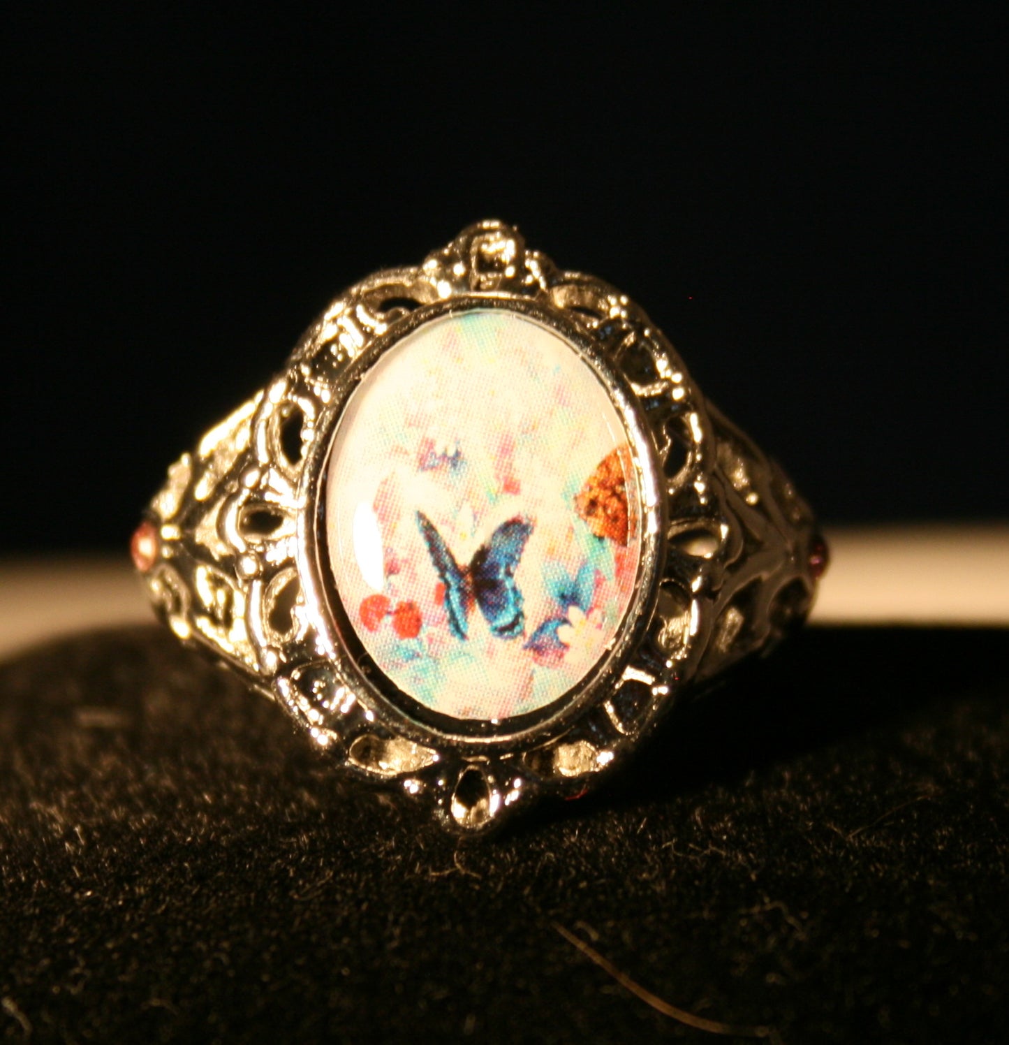 oval cameo ring with butterflies