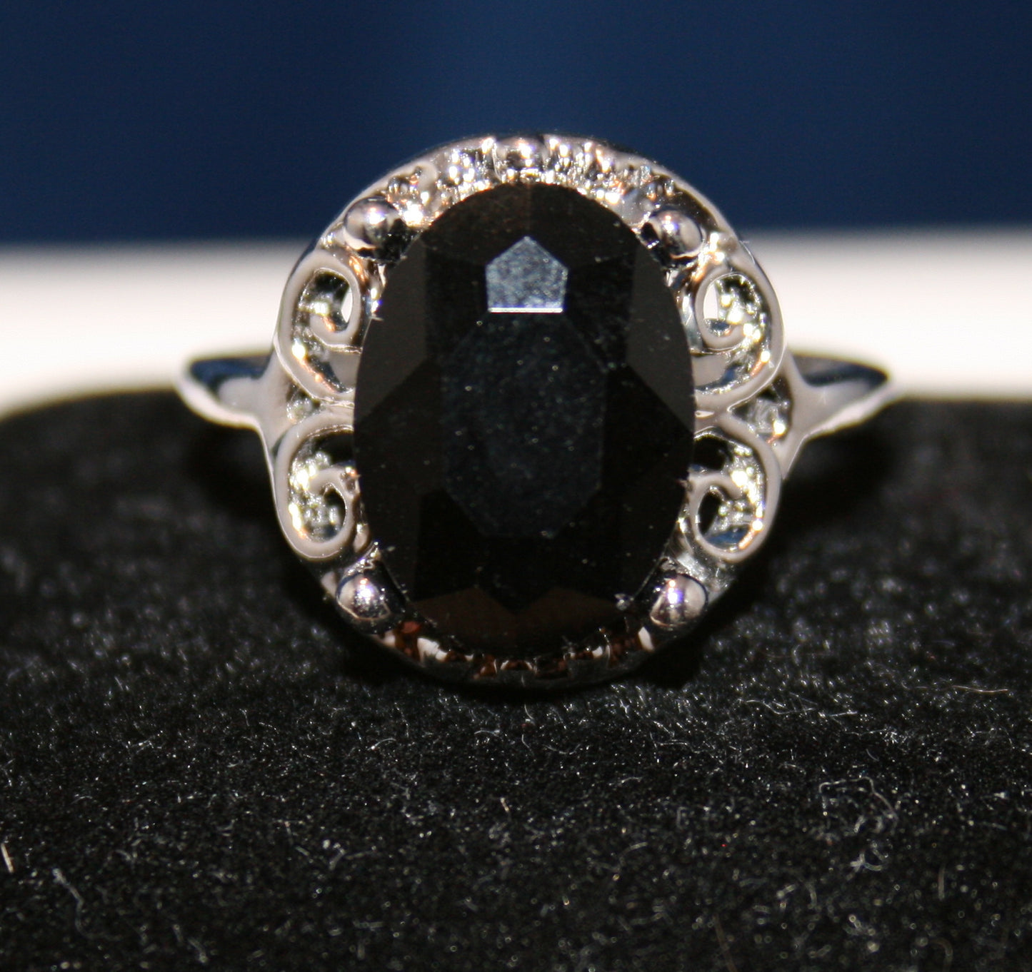 large, oval-shaped black gemstone