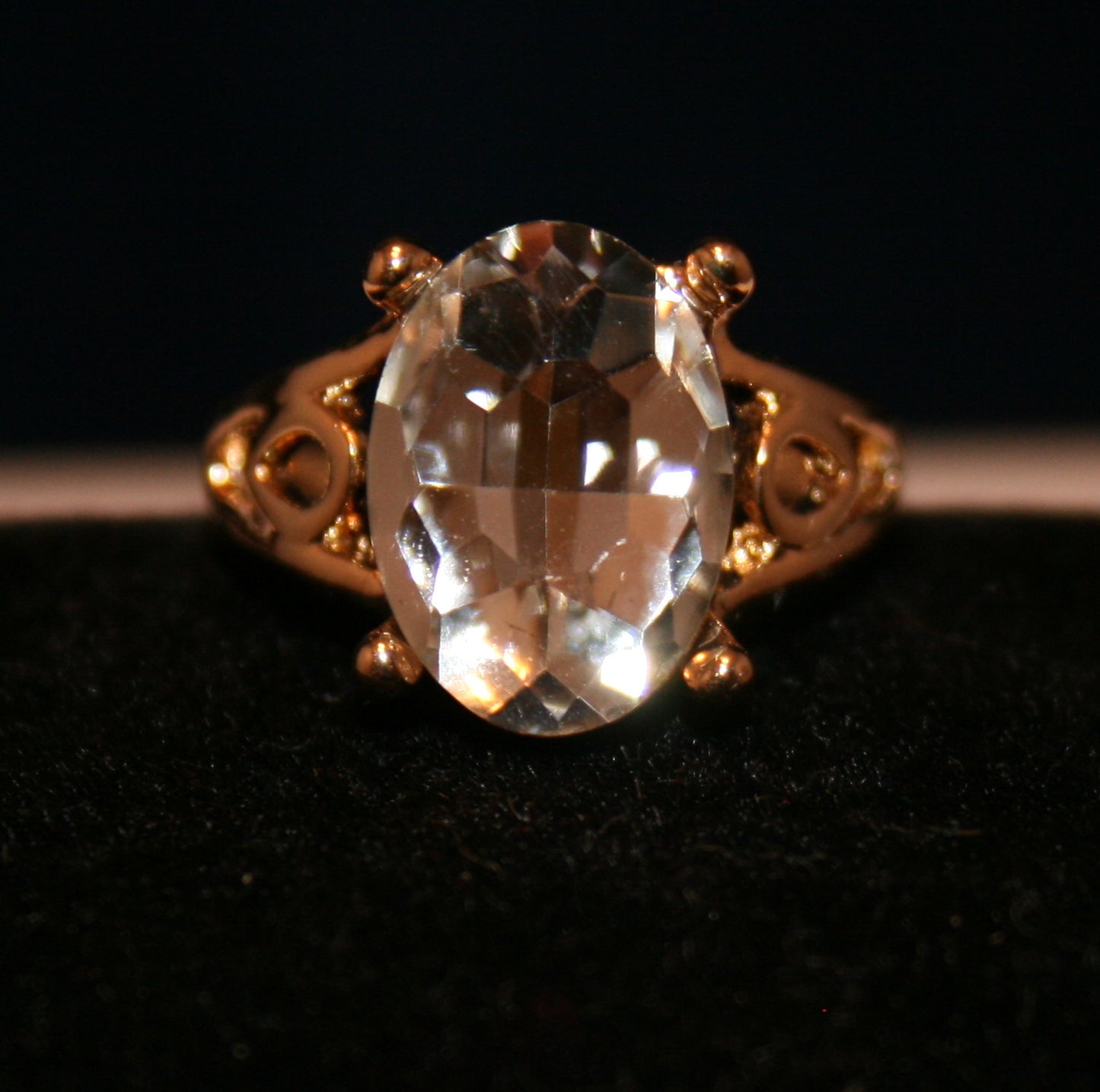 large, clear oval-shaped, faceted gemstone