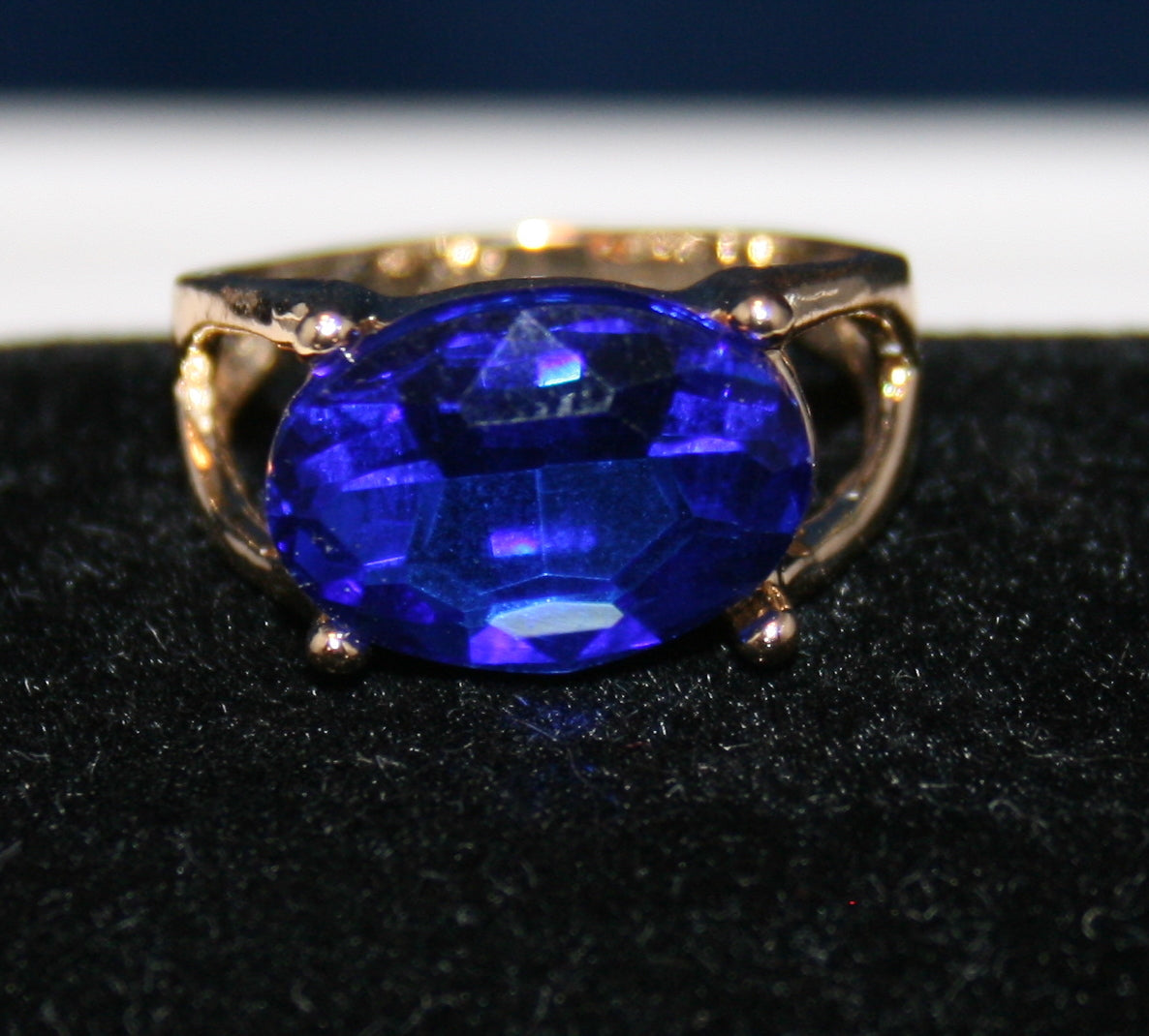 large, oval-shaped blue gemstone