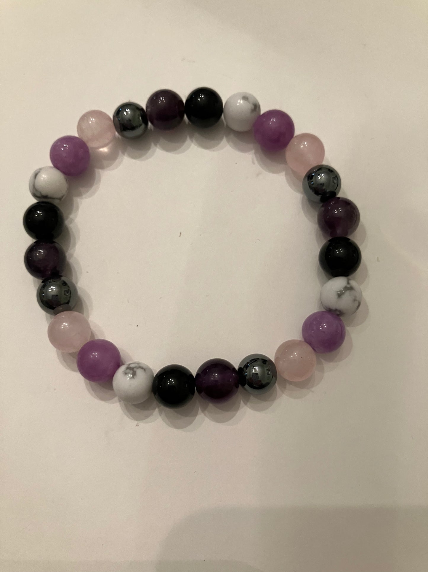 Purple, Black, White, and Pink Brscelet