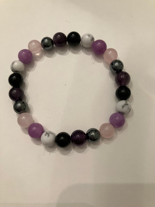 Purple, Black, White, and Pink Brscelet